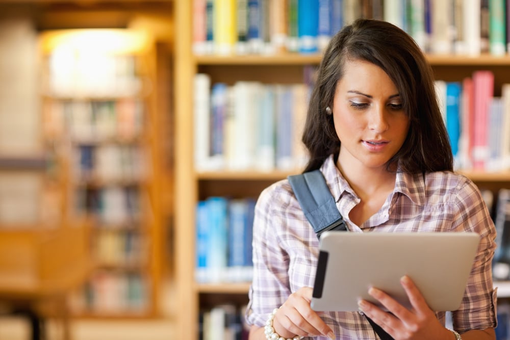 Stock_Image_student_using_tablet_in_library